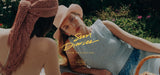 Women wearing handmade hats from the brand Ser by Andrea Agudelo